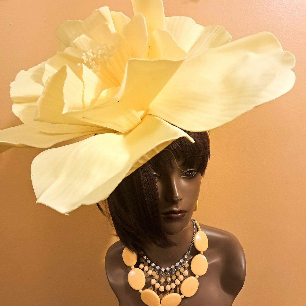 Dramatic Yellow Hat with Oversized Design